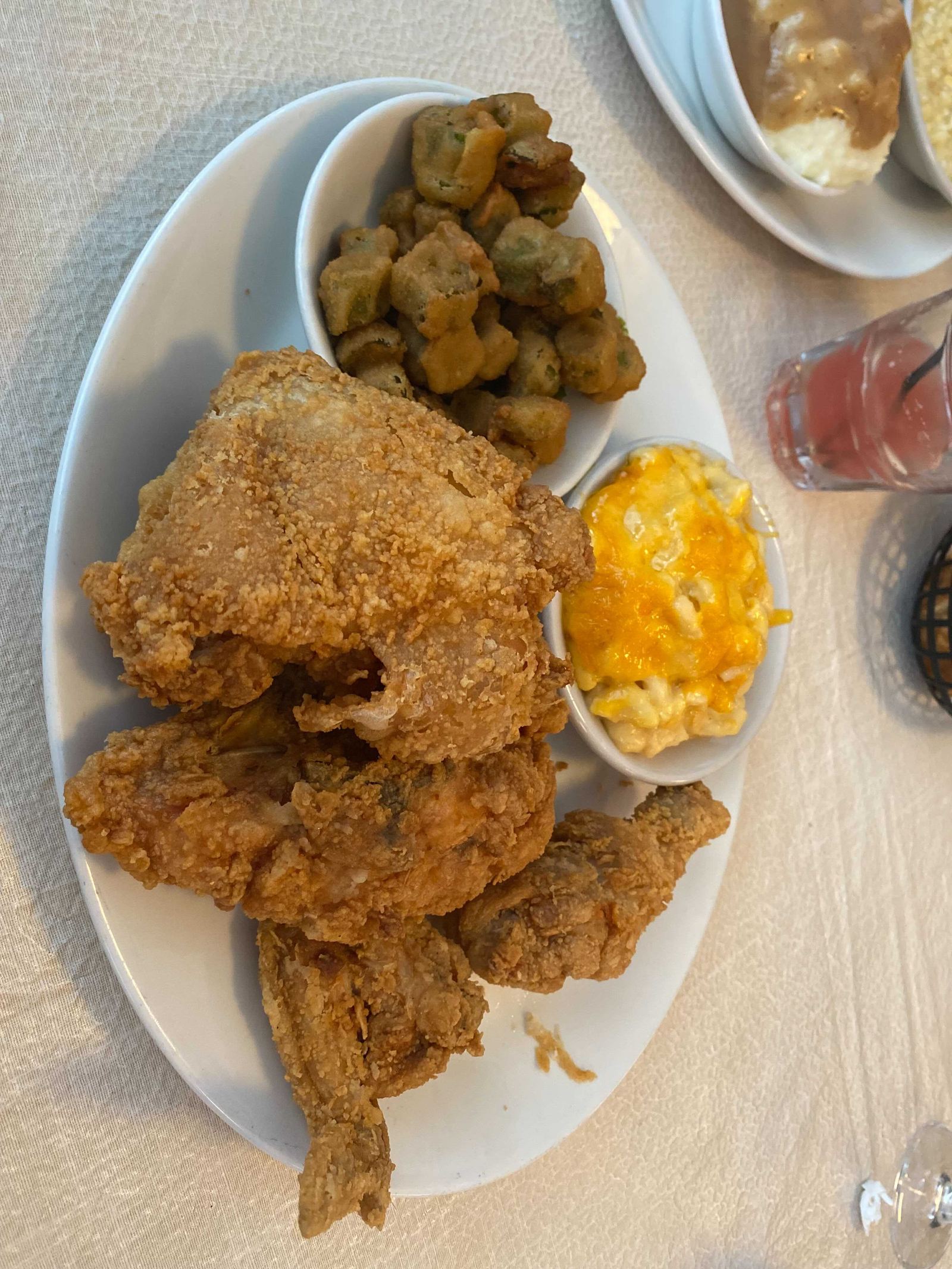 Plate of fried chicken with fried okra and macaroni and cheese at Mary Mac's Tea Room in Atlanta