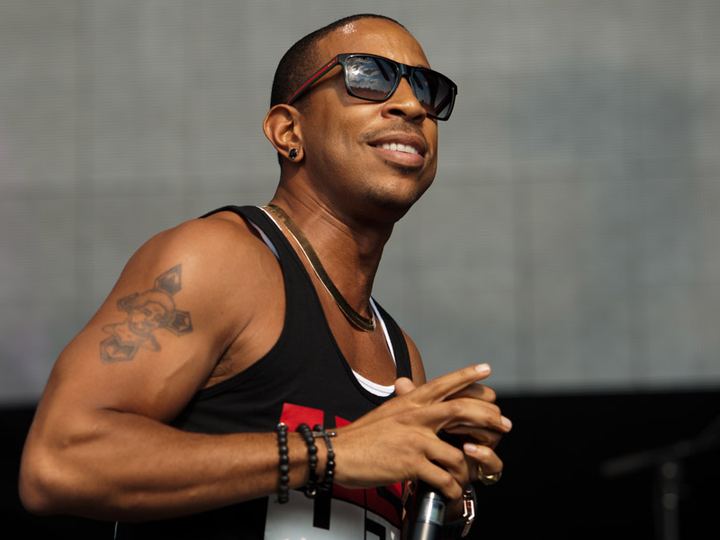 Ludacris performing on stage in sunglasses at Music Midtown in Atlanta
