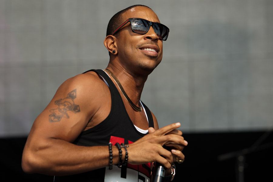 Ludacris performing on stage in sunglasses at Music Midtown in Atlanta