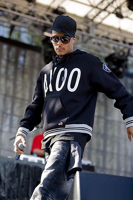 T.I. performing on an outdoor festival stage